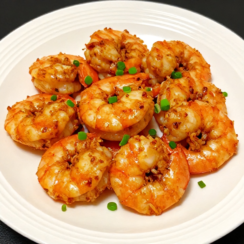 Plated Honey Garlic Shrimp with green onions