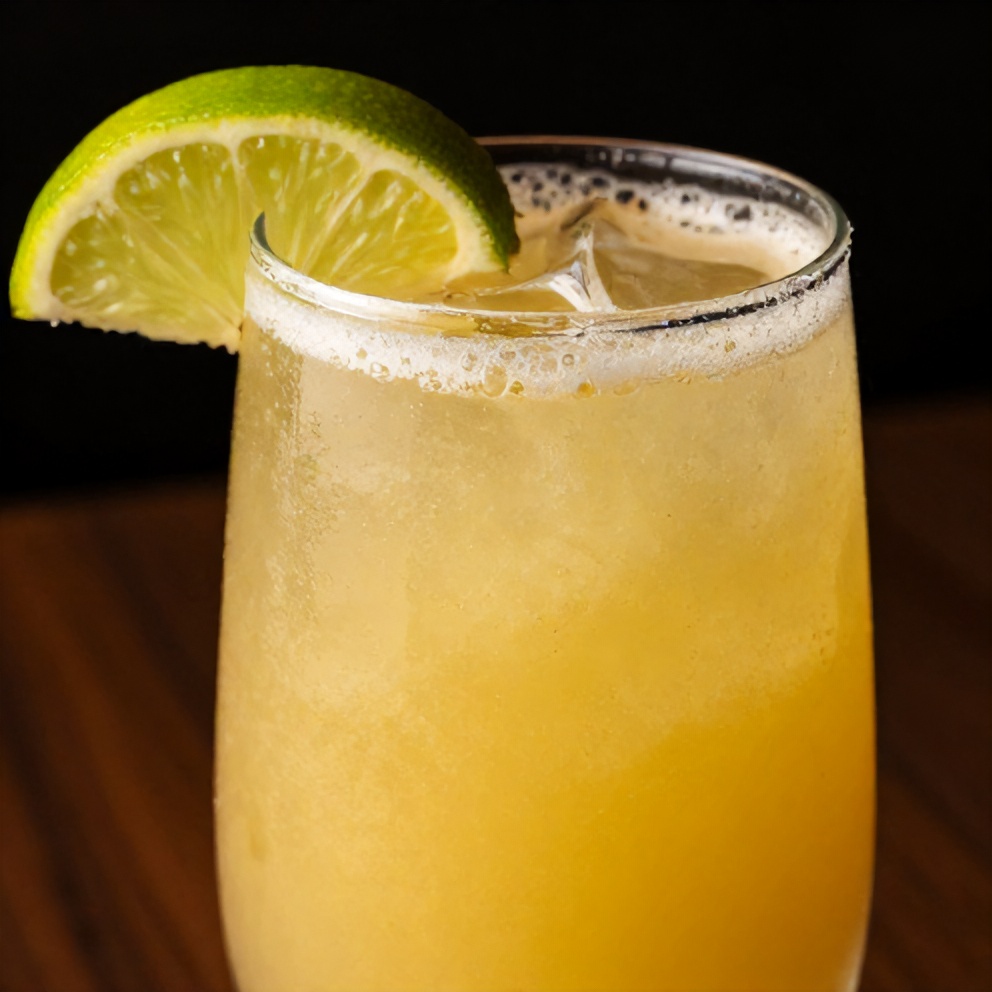 Pineapple Margarita Mocktail Garnished with Lime Wheel